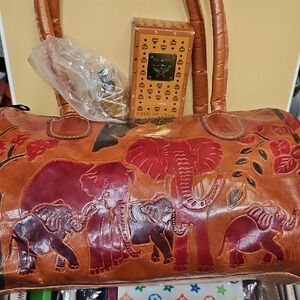 Elephant Embossed Brown Leather Handbag With Extra Items